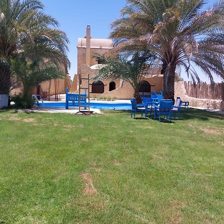 Villa 7 Al Fayyūm Buitenkant foto